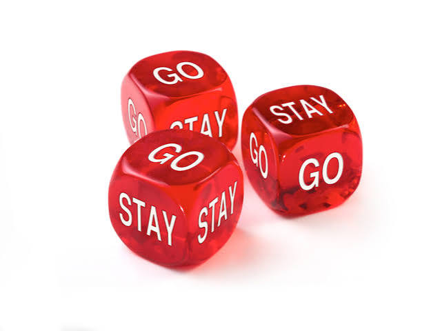 引用帖附图：刻有 GO / STAY 的红色骰子